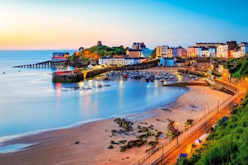 Tenby Harbour and its pastel waterfront at dusk